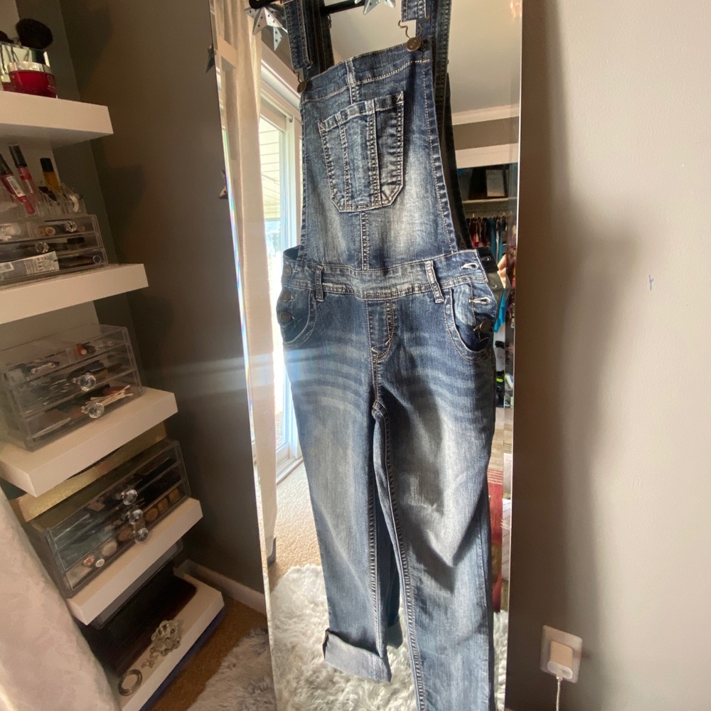 Woman’s skinny leg overalls size small